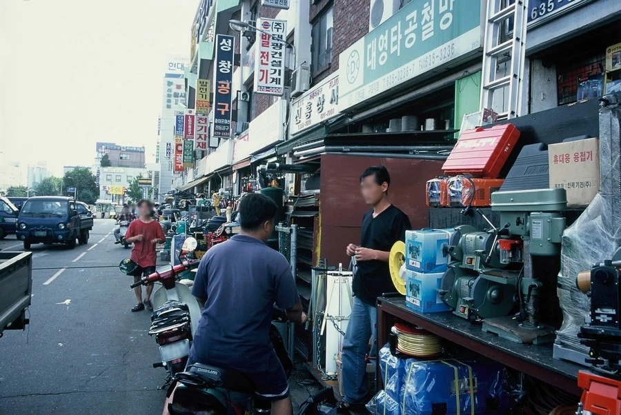 People working at the shopfronts