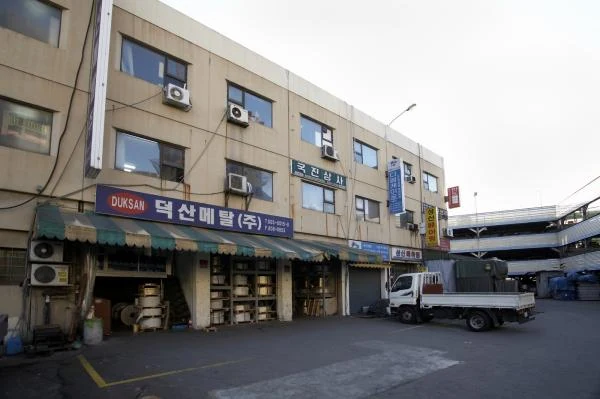 Buildings and a delivery truck